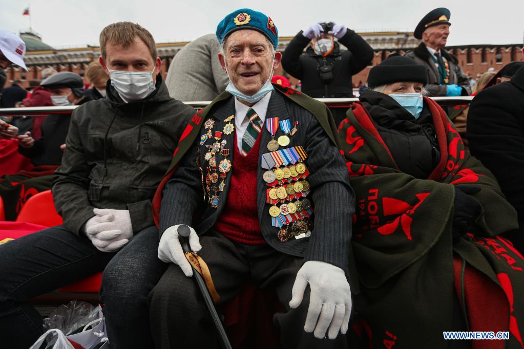 A veteran (C) of World War II seats on the tribune during the military parade marking the 76th anniversary of the Soviet victory in the Great Patriotic War, Russia's term for World War II, on Red Square in Moscow, Russia, May 9, 2021. (Xinhua/Evgeny Sinitsyn)