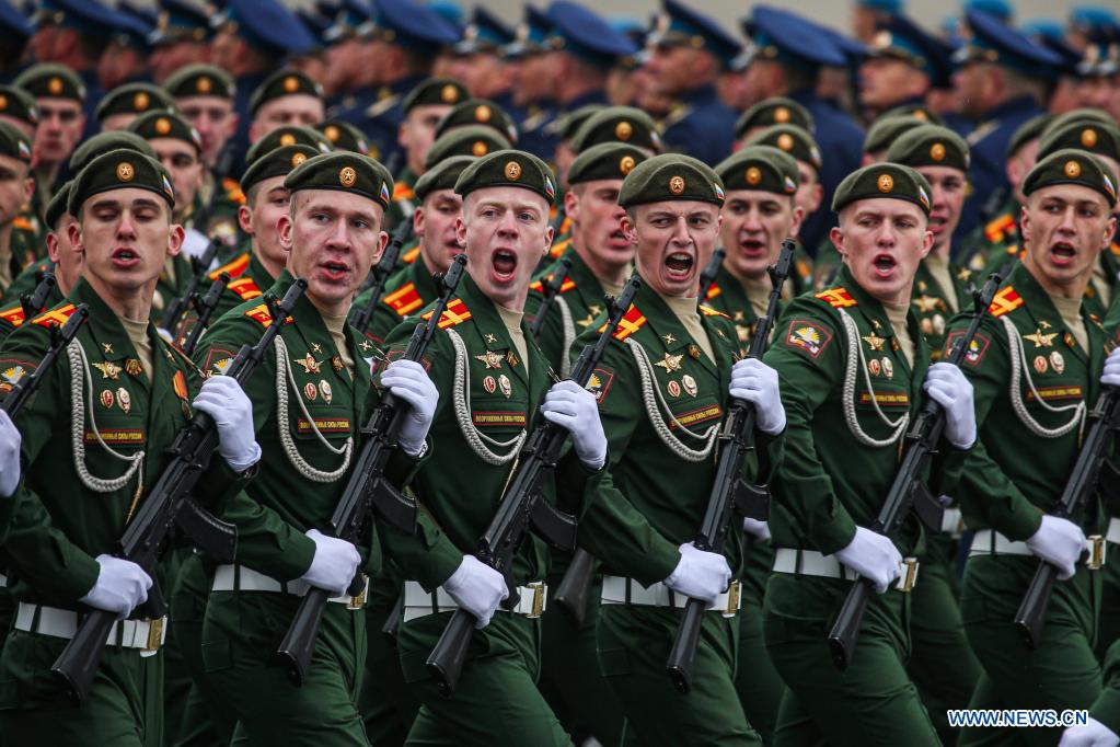 Servicemen march during the military parade marking the 76th anniversary of the Soviet victory in the Great Patriotic War, Russia's term for World War II, on Red Square in Moscow, Russia, May 9, 2021. (Xinhua/Evgeny Sinitsyn)