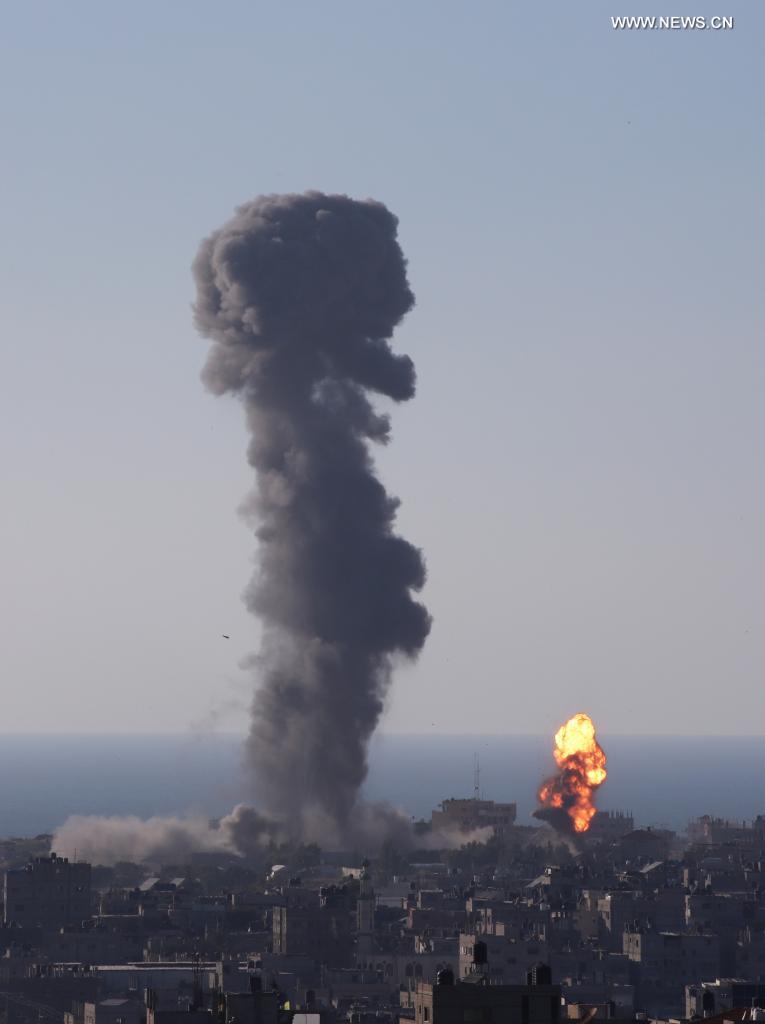 Photo taken on May 13, 2021 shows explosions following Israeli airstrikes in the southern Gaza Strip city of Rafah. Thursday was another day of intense fighting between Israel and Hamas, as more than 1,700 missiles have been fired from the Gaza Strip into Israel in the last three days while the Israeli military has conducted hundreds of airstrikes in Gaza. (Photo by Khaled Omar/Xinhua)