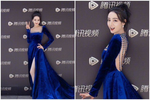 迪丽热巴穿高衩礼服走红毯 甜笑跨步踩到裙摆绊到
