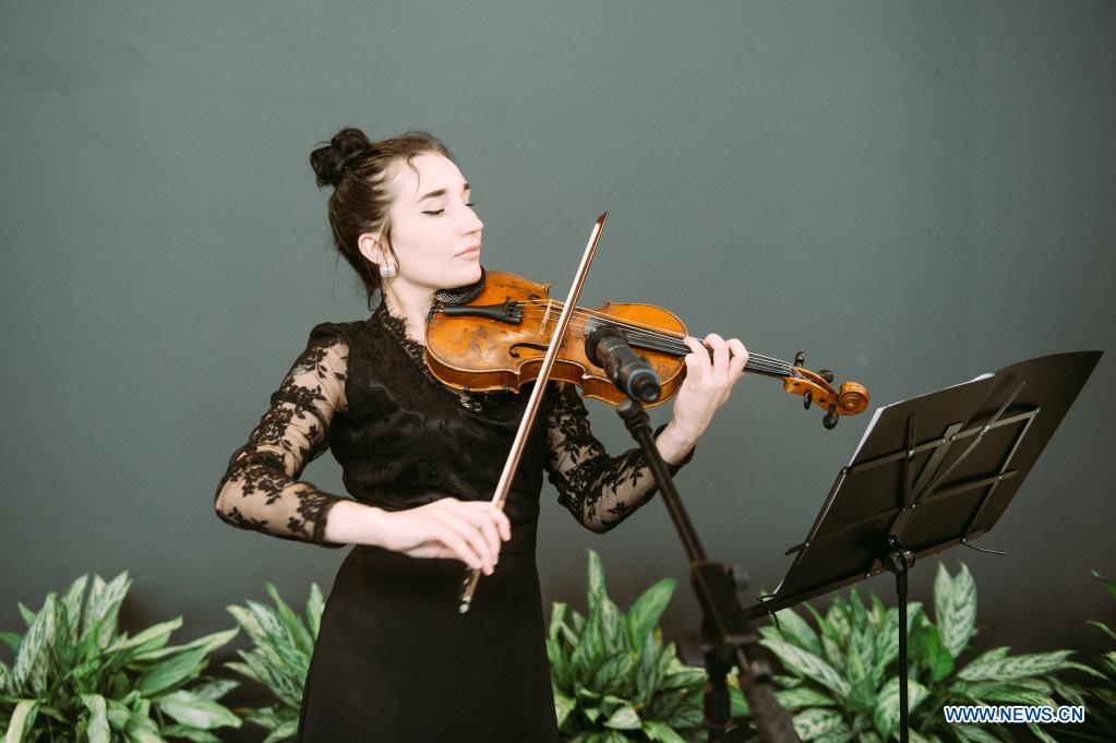 A violinist plays at the 2nd China-Central and Eastern European Countries (CEEC) Expo in Ningbo, east China's Zhejiang Province, June 8, 2021. The 2nd China-CEEC Expo opened in Ningbo on Tuesday. (Xinhua/Jiang Han)