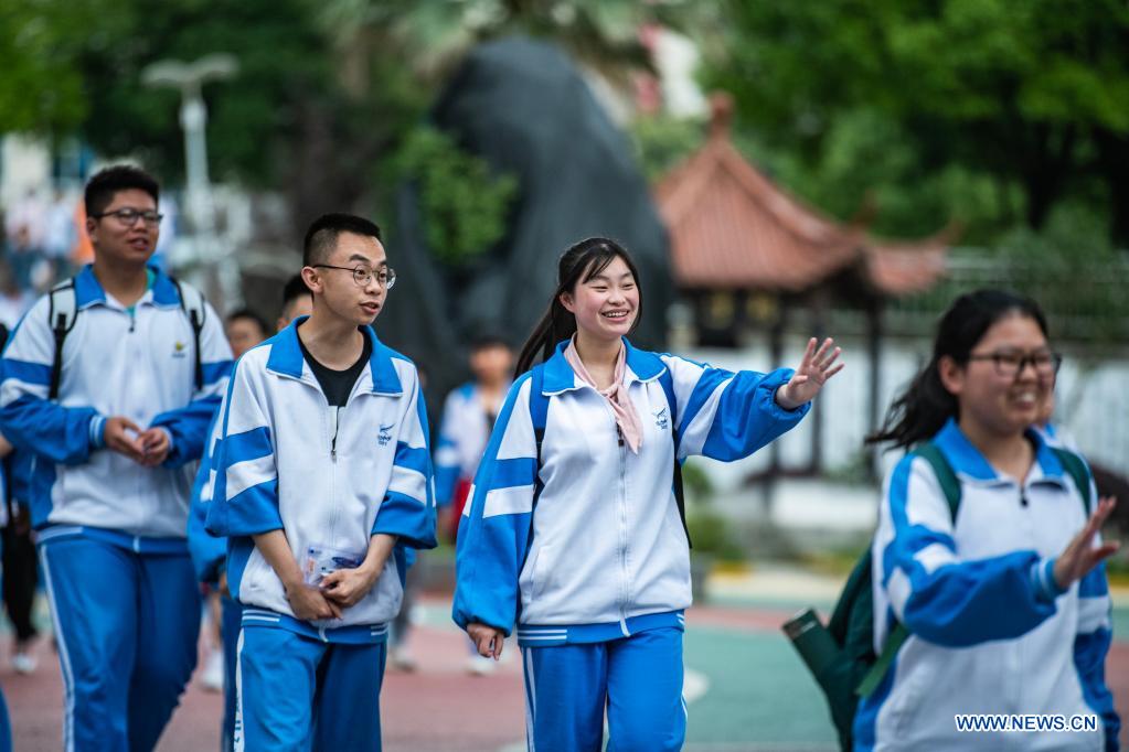 Examinees walk out of an exam site at a high school in Guiyang, the capital city of southwest China's Guizhou Province, June 8, 2021. China's annual college entrance exam concluded on Tuesday in some parts of the country. Considered the world's most grueling test, the exam, better known as the Gaokao, saw a record 10.78 million candidates signing up this year. (Xinhua/Tao Liang)