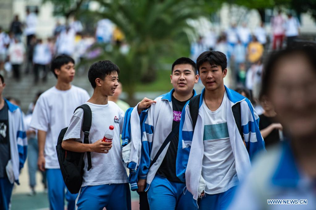 Examinees walk out of an exam site at a high school in Guiyang, the capital city of southwest China's Guizhou Province, June 8, 2021. China's annual college entrance exam concluded on Tuesday in some parts of the country. Considered the world's most grueling test, the exam, better known as the Gaokao, saw a record 10.78 million candidates signing up this year. (Xinhua/Tao Liang)