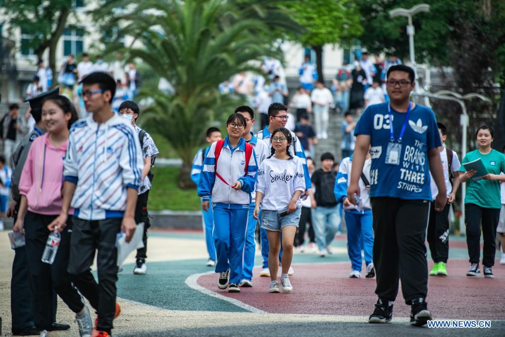 Examinees walk out of an exam site at a high school in Guiyang, the capital city of southwest China's Guizhou Province, June 8, 2021. China's annual college entrance exam concluded on Tuesday in some parts of the country. Considered the world's most grueling test, the exam, better known as the Gaokao, saw a record 10.78 million candidates signing up this year. (Xinhua/Tao Liang)