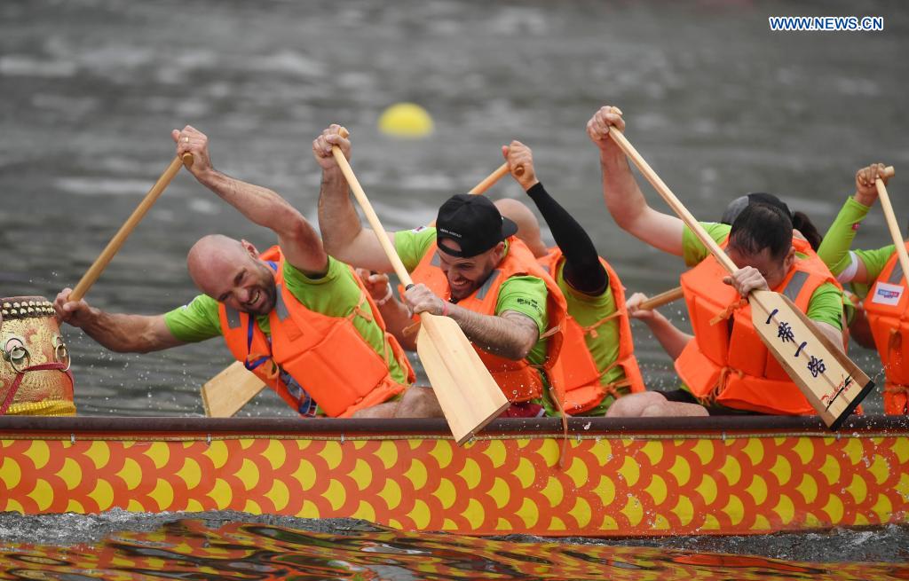 People participate in a dragon boat race to celebrate the Dragon Boat Festival in Tianjin, north China, June 14, 2021. China celebrated the Dragon Boat Festival on Monday to commemorate Qu Yuan, a patriotic poet from the Warring States Period (475-221 BC). (Xinhua/Zhao Zishuo)