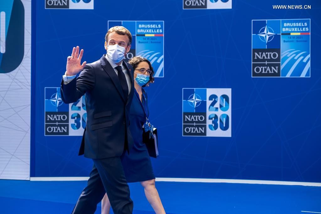 French President Emmanuel Macron (Front) arrives for a NATO summit at NATO headquarters in Brussels, Belgium, on June 14, 2021. Leaders of the North Atlantic Treaty Organization (NATO) held a face-to-face summit on Monday to show their unity and agreed on the 