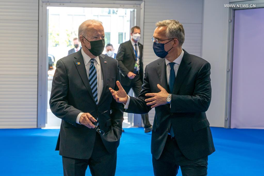 NATO Secretary General Jens Stoltenberg (R, Front) welcomes U.S. President Joe Biden (L, Front) at NATO headquarters in Brussels, Belgium, on June 14, 2021. Leaders of the North Atlantic Treaty Organization (NATO) held a face-to-face summit on Monday to show their unity and agreed on the 