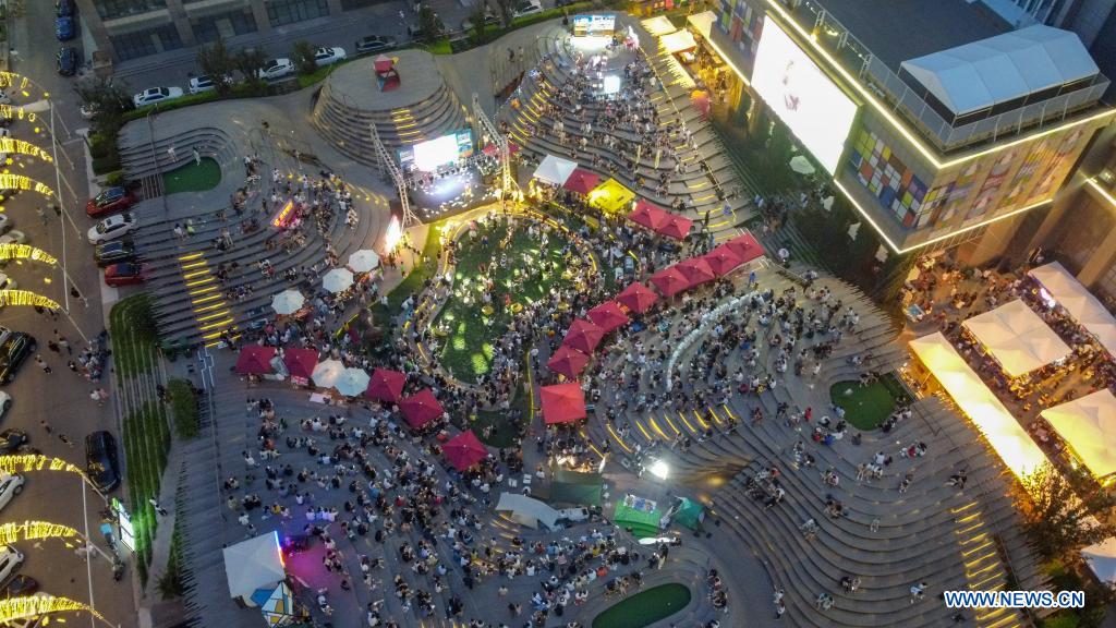 Aerial photo taken on July 10, 2021 shows the venue of a drinking carnival in Xiqing District of north China's Tianjin. A drinking carnival called 