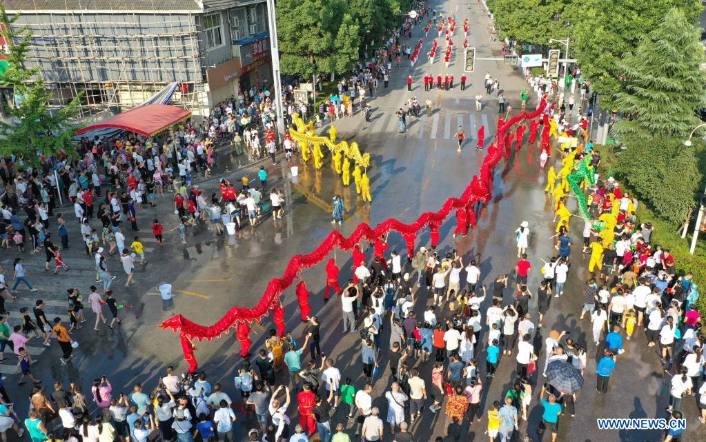 Aerial photo shows dragon dance teams performing during 