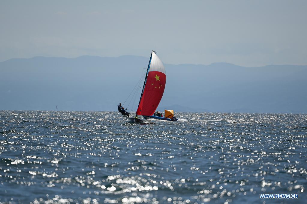 Chinese sailors of women's 470 class Chen Shasha(L) and Jin Ye attend a training session at Enoshima Yacht Harbour, in Kanagawa, Japan, on July 20, 2021. (Xinhua/Huang Zongzhi)