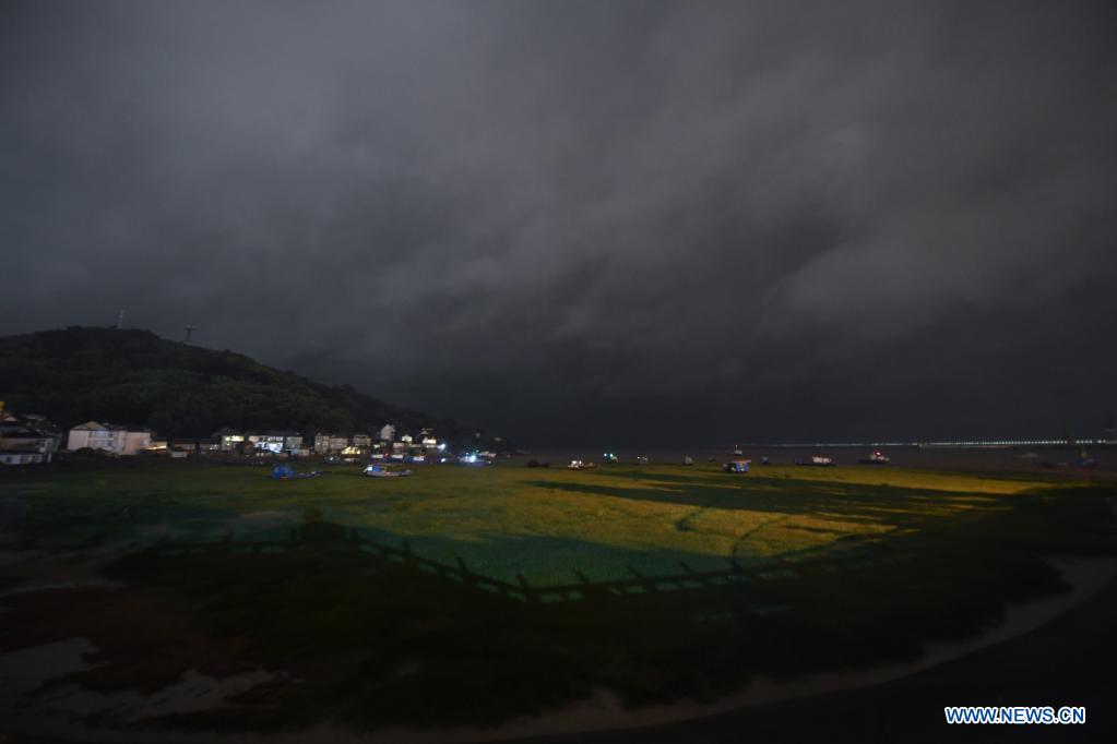 Photo taken on July 25, 2021 shows a park in Pinghu, Jiaxing, east China's Zhejiang Province. China's national observatory on Sunday continued its orange alert for Typhoon In-Fa, which made landfall in Zhejiang at around Sunday noon. Moving northwestward at about 10 km per hour, In-Fa will make another landfall in coastal areas from Pinghu in Zhejiang Province to Pudong in Shanghai, according to the National Meteorological Center. (Xinhua/Xu Yu)