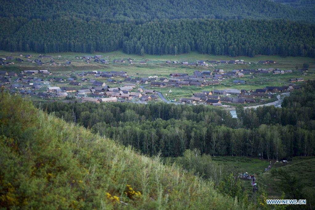 Photo taken on July 24, 2021 shows the scenery of Hemu Village of Kanas in Altay, northwest China's Xinjiang Uygur Autonomous Region. The Kanas scenic area, which is at the height of the tourist season, received over 6.2 million tourists from May 1 to July 27, according to the local authority. (Xinhua/Sadat)