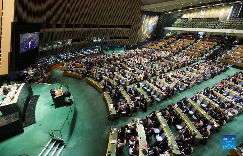 Abdulla Shahid (at the podium and on the screen), president of the 76th session of the United Nations General Assembly, presides over the opening of the General Debate of the 76th session of the UN General Assembly at the UN headquarters in New York, on Sept. 21, 2021. The General Debate of the 76th session of the UN General Assembly opened on Tuesday. (Xinhua/Wang Ying)