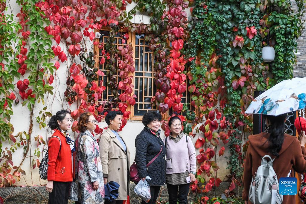 Elders pose for group photo at a scenic spot in Zhongshan District of Liupanshui, southwest China's Guizhou Province, Oct. 14, 2021. Various activities are carried out in the district to celebrate the Double Ninth Festival or the Chongyang Festival for the elders. The festival, celebrated throughout China on the ninth day of the ninth month on the Chinese lunar calendar, is an occasion to care for and send blessings to the elderly. (Xinhua/Tao Liang)