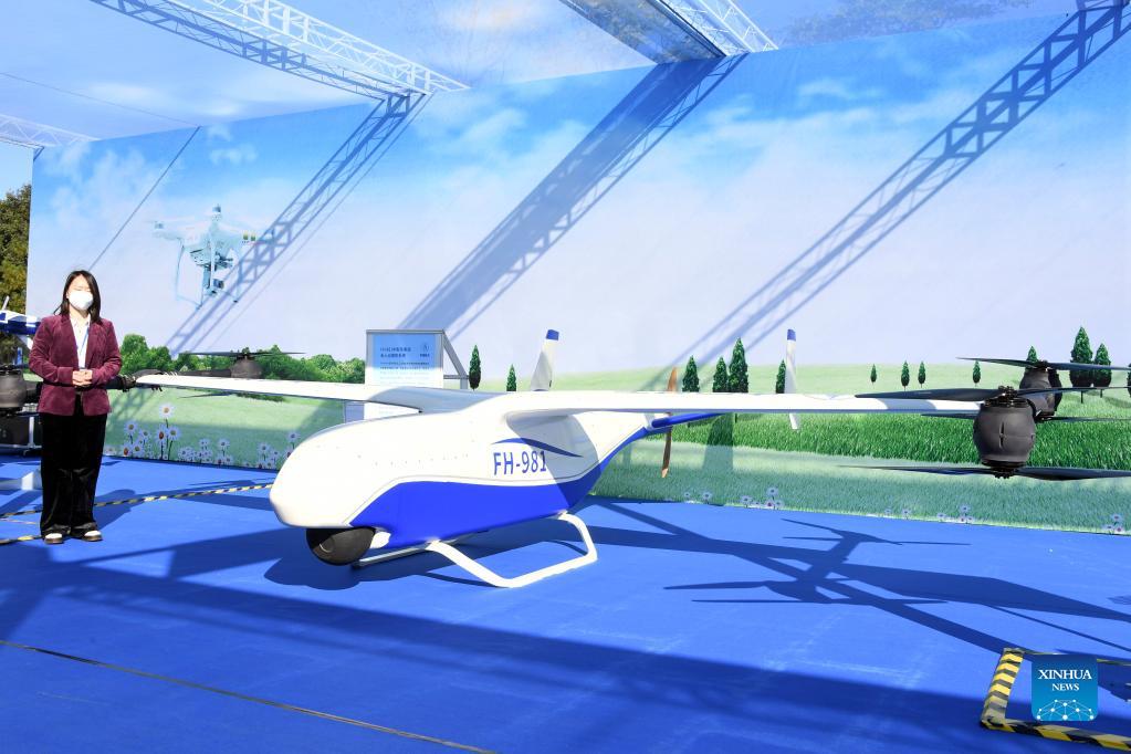 A versatile drone is displayed at an exhibition to mark the 2021 National Mass Innovation and Entrepreneurship Week in Beijing, capital of China, Oct. 19, 2021. The 2021 National Mass Innovation and Entrepreneurship Week was opened on Tuesday. (Xinhua/Ren Chao)