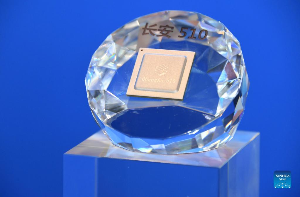 The sample of a high-performance chip dedicated to block chain application is displayed at an exhibition to mark the 2021 National Mass Innovation and Entrepreneurship Week in Beijing, capital of China, Oct. 19, 2021. The 2021 National Mass Innovation and Entrepreneurship Week was opened on Tuesday. (Xinhua/Ren Chao)