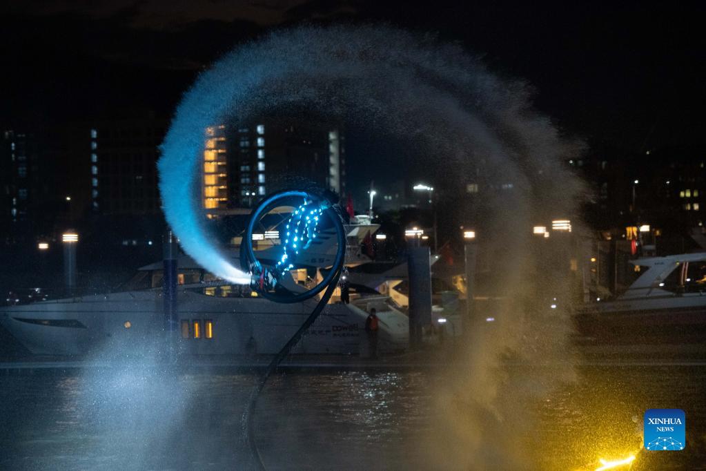 Photo taken on Nov. 11, 2021 shows a water jet show at the opening ceremony of the 11th China (Macao) International Yacht Import and Export Fair in Macao, south China. The yacht fair kicked off here on Thursday. (Xinhua/Cheong Kam Ka)