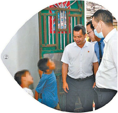  图②:湛江市检察院检察长张和林(右一)关心未成年被害人生活情况。 