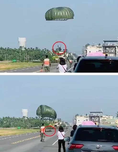 有人在屏东直击伞兵疑降落伞打结重摔柏油路。图自台湾“中时新闻网”