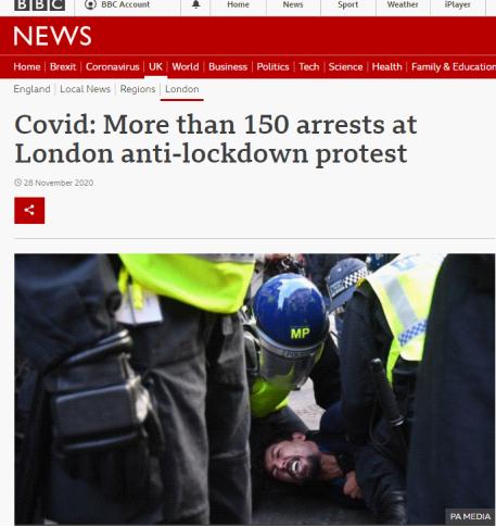 △BBC2020年11月28日的報道配圖顯示,幾名英國警察合力制服參加“反封城”游行的示威者。