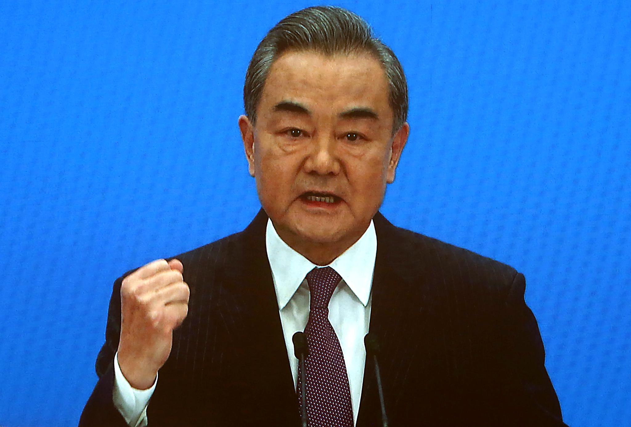 2021全国两会,国务委员兼外交部长王毅就“中国外交政策和对外关系”相关问题回答中外记者提问 图片来源:澎湃影像