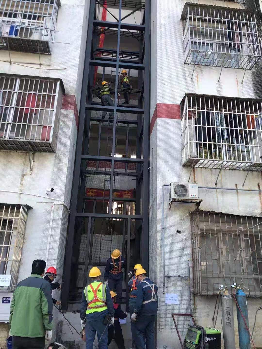 告别"爬梯难"!梅华街道又一老楼加装电梯投入使用