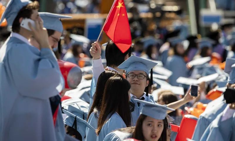 2019年5月,中国留学生参加哥伦比亚大学毕业典礼。图源:新华社