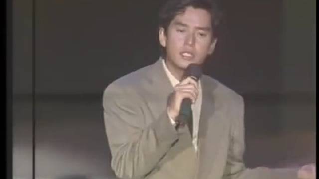 谭咏麟在1991央视春晚上的一首水中花迅速红遍了全国