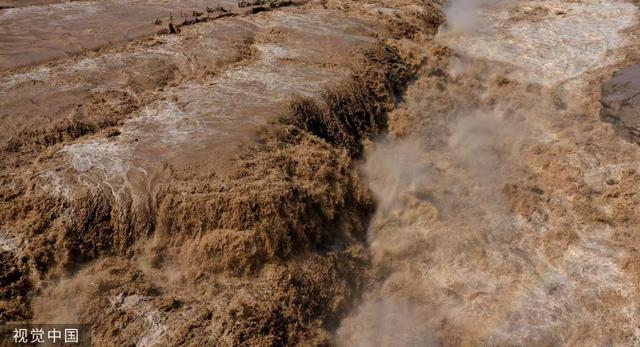 山西临汾:黄河壶口瀑布迎来秋汛 水花飞溅形成彩虹休闲区蓝鸢梦想 - Www.slyday.coM 山西临汾:黄河壶口瀑布迎来秋汛 水花飞溅形成彩虹休闲区蓝鸢梦想 - Www.slyday.coM
