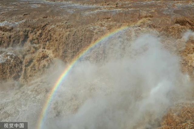 山西临汾:黄河壶口瀑布迎来秋汛 水花飞溅形成彩虹休闲区蓝鸢梦想 - Www.slyday.coM 山西临汾:黄河壶口瀑布迎来秋汛 水花飞溅形成彩虹休闲区蓝鸢梦想 - Www.slyday.coM