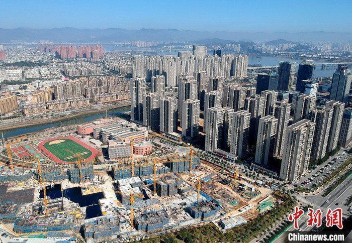 资料图:航拍一处新建住宅。中新社记者 吕明 摄