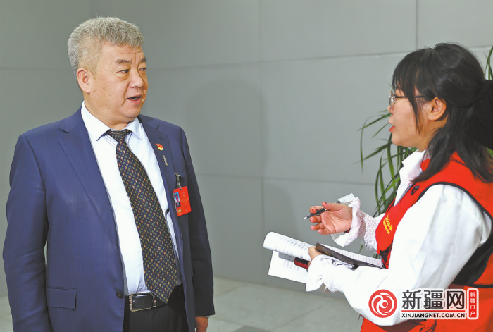 王进(全媒体记者石磊 于卓摄)