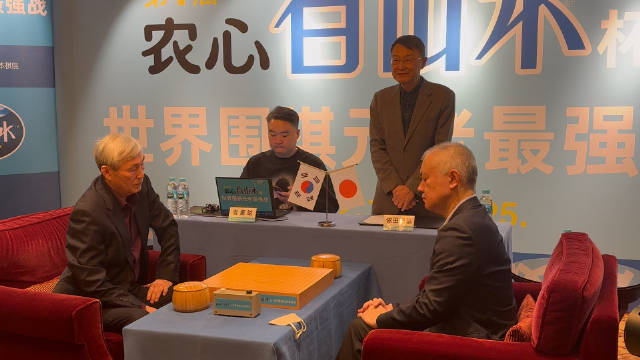 日本主将依田纪基九段攻擂曹薰铉九段_新浪新闻