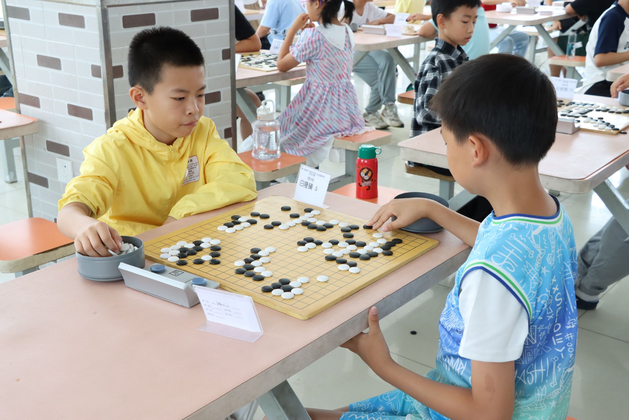 延慶圍棋段位賽現場,小選手們精彩的對決輪番上演。劉紀元 攝