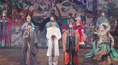 音乐话剧《受到召唤·敦煌》剧照。身着白色服装者为张艺兴。中国国家话剧院供图