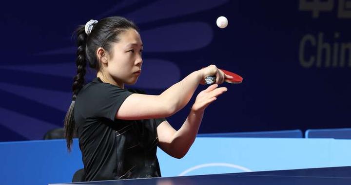 乒乓球残奥冠军也是摄影玩家