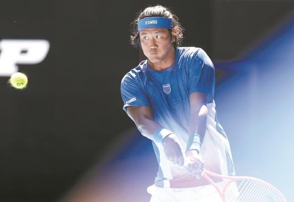 张之臻“登山”道阻且长