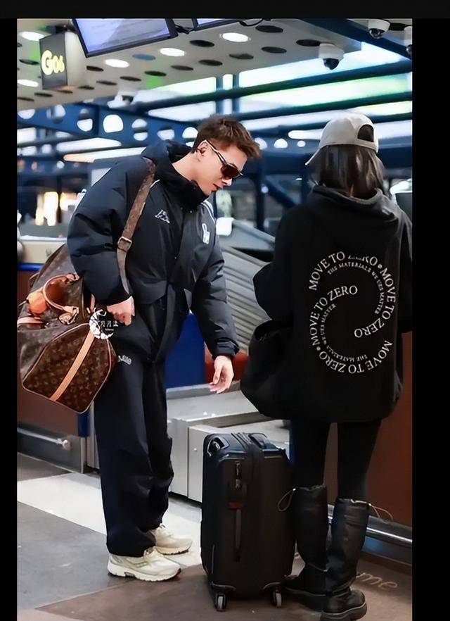 夫妻同框,吴谨言洪尧机场合体,幸福感十足!