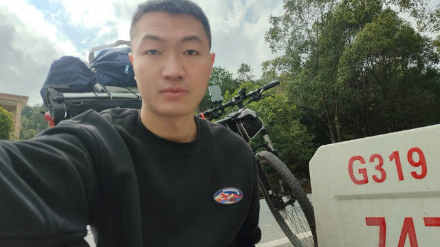 黔西小伙骑行跨返乡