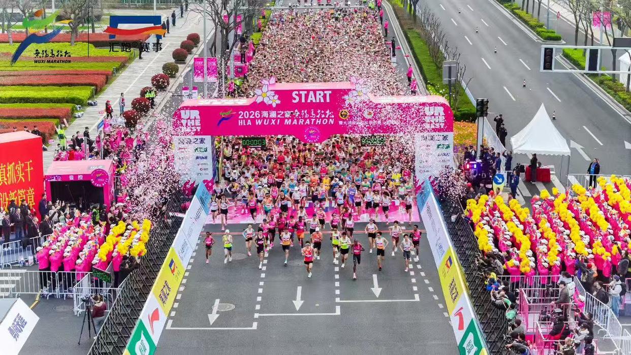 与马拉松精神同频共振，一汽奥迪以智电双旗舰领跑无锡马拉松