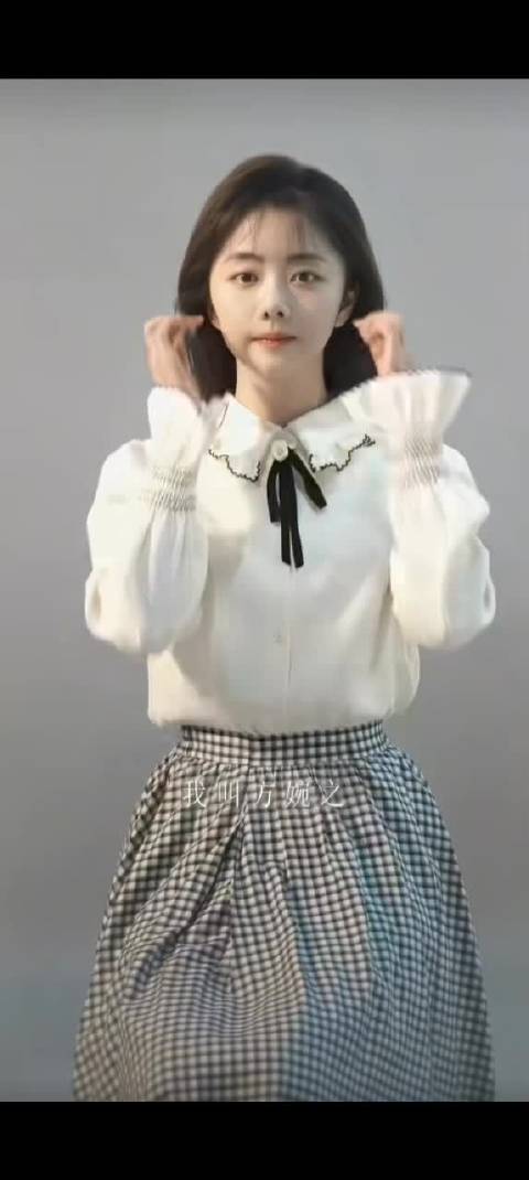 谭…