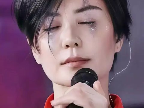 王菲舞台闪片泪痕妆出圈，破碎冷艳质感惊艳时尚舞台