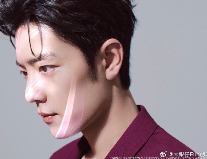 肖战被拍三重含义：防晒、摄影与抵制代拍