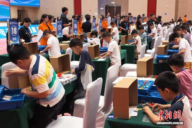 图为比赛现场。中新网记者 肖江川 摄