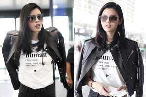 奚梦瑶披皮衣秀美腿似黑道大姐大