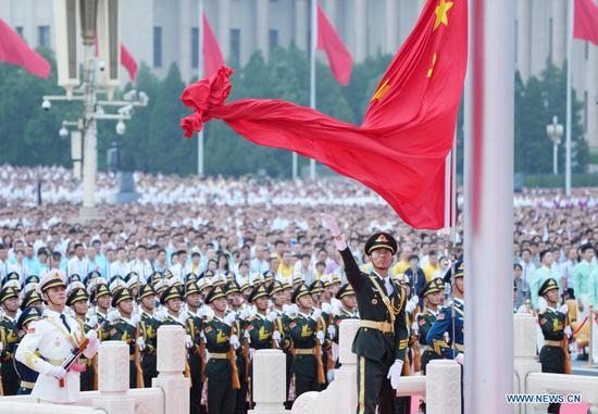 A national flag-raising ceremony is held at Tian'anmen Square during a ceremony marking the centenary of the Communist Party of China (CPC) in Beijing, capital of China, July 1, 2021. (Xinhua/Wang Yuguo)