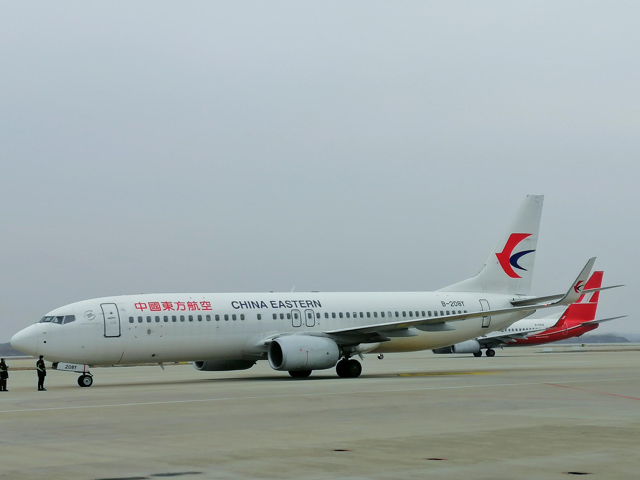 2020年2月24日13时24分许，搭载了160名返沪复工人员的FM9390航班抵达上海浦东国际机场。东航  供图