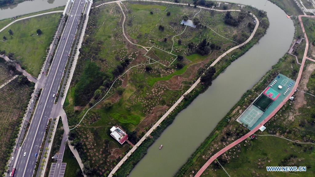 Aerial photo taken on July 6, 2021 shows a view along the Grand Canal in Cangzhou City of north China's Hebei Province. Authorities in Cangzhou City has been actively promoting the Grand Canal culture by improving scenery along the watercourse so that visitors may have close experience with its beauty. (Xinhua/Luo Xuefeng)