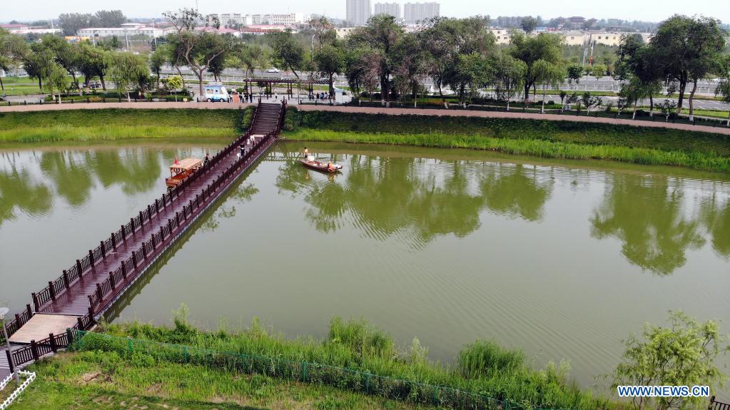 Aerial photo taken on July 6, 2021 shows a view along the Grand Canal in Cangzhou City of north China's Hebei Province. Authorities in Cangzhou City has been actively promoting the Grand Canal culture by improving scenery along the watercourse so that visitors may have close experience with its beauty. (Xinhua/Luo Xuefeng)