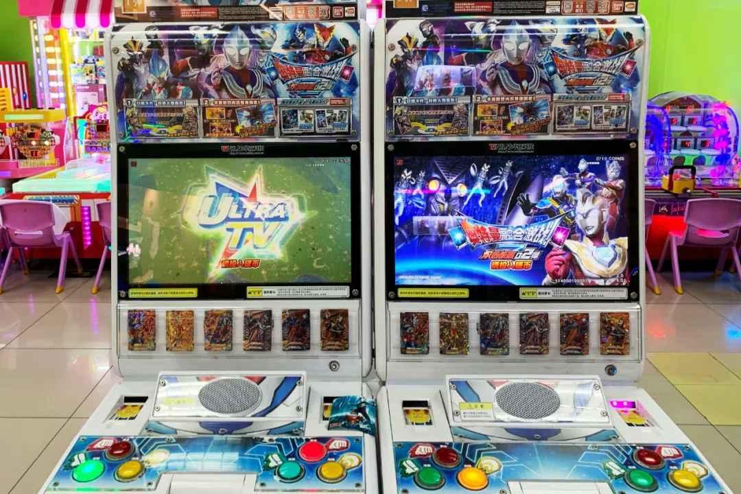 (华立科技的奥特曼卡片需要搭配游戏设备体验。市界拍摄)